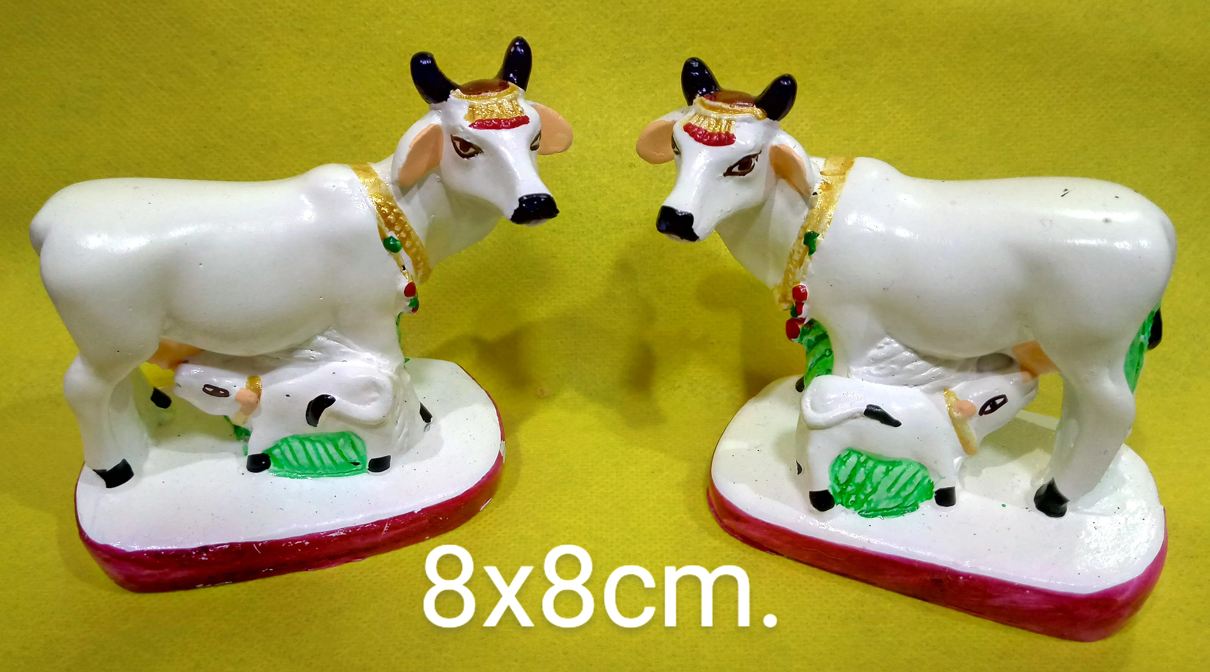 COW AND CALF ON STAND 8x8 CM.